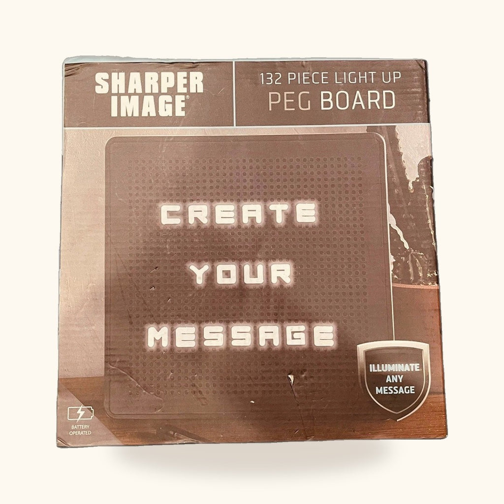 Tablero de mensajes luminoso Sharper Image, 132 piezas