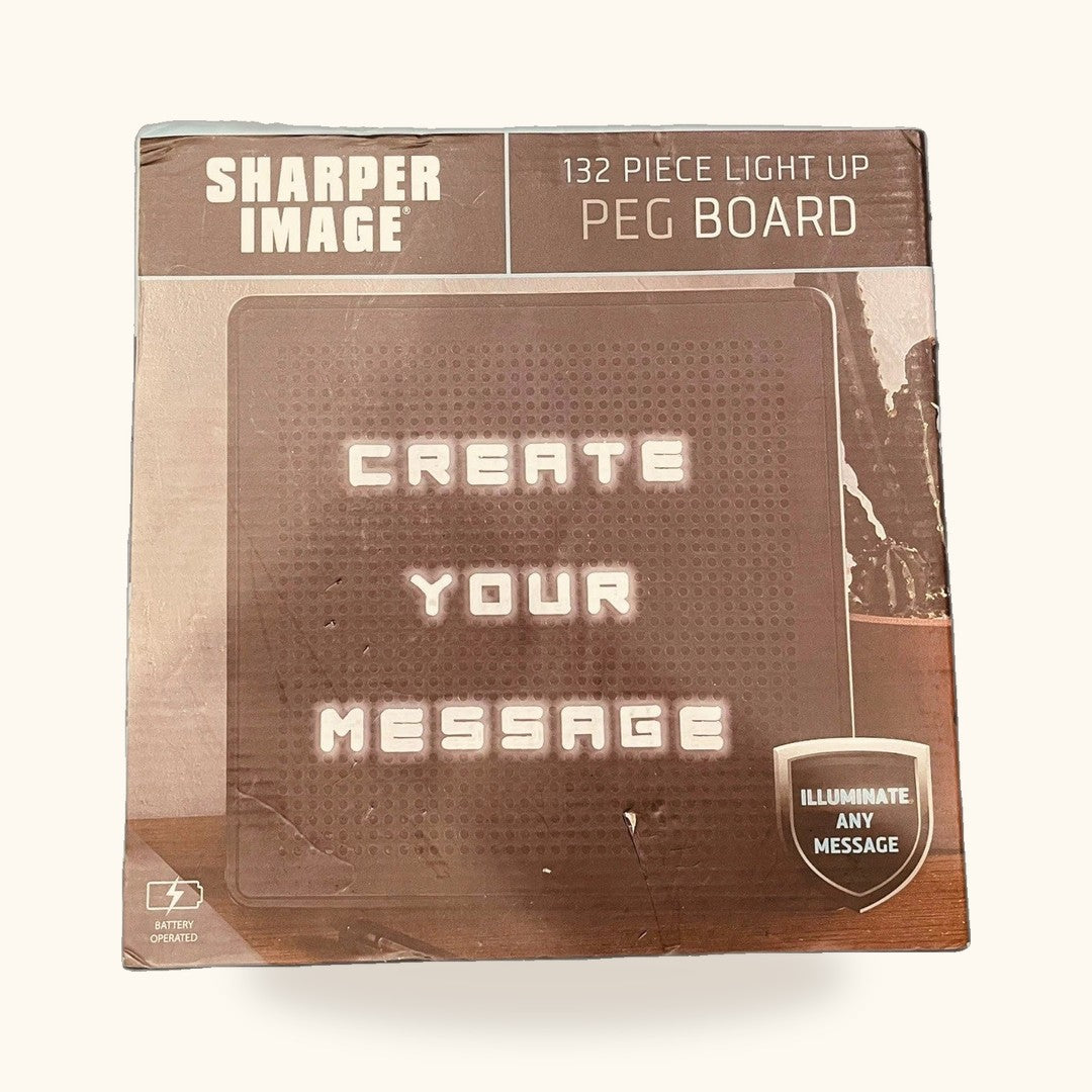 Tablero de mensajes luminoso Sharper Image, 132 piezas