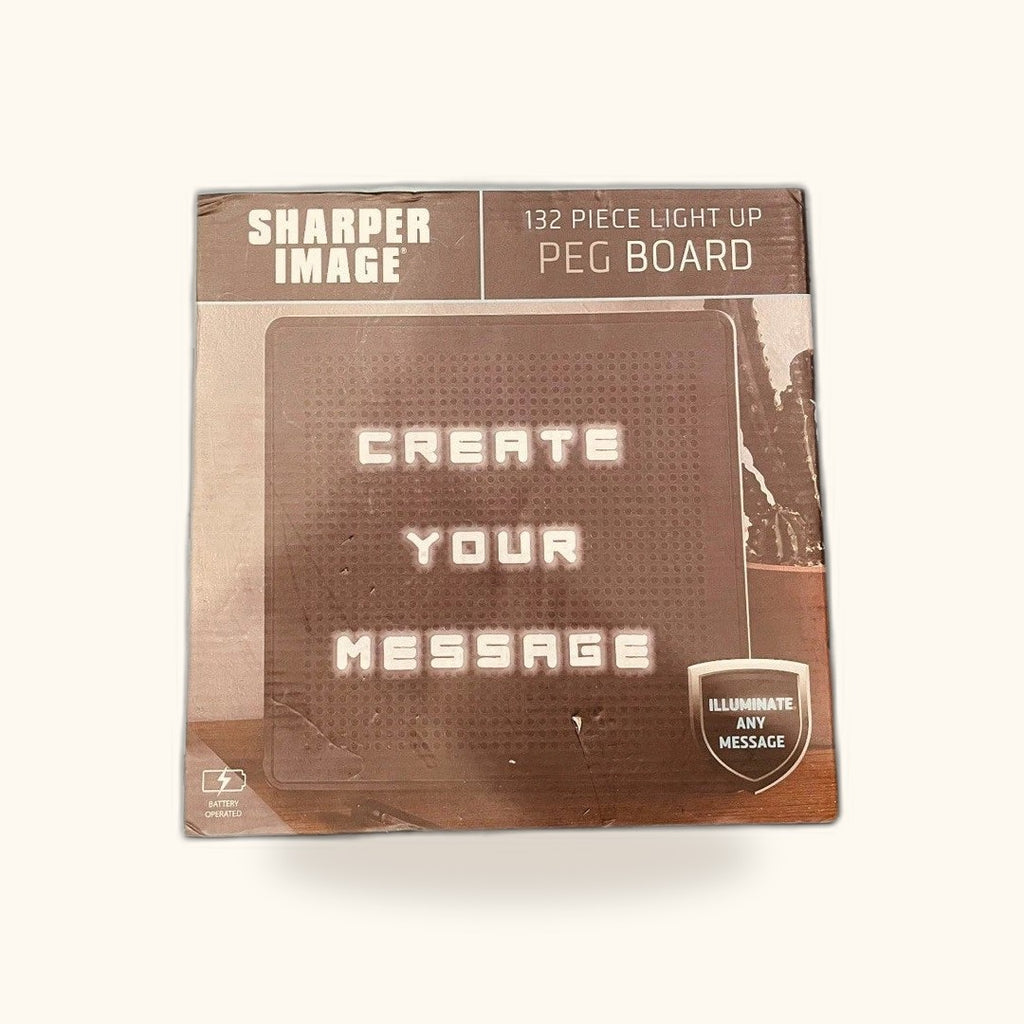 Tablero de mensajes luminoso Sharper Image, 132 piezas