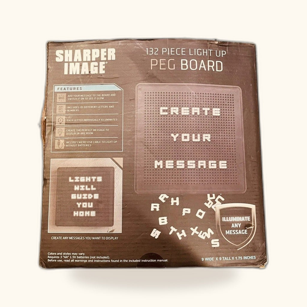Tablero de mensajes luminoso Sharper Image, 132 piezas