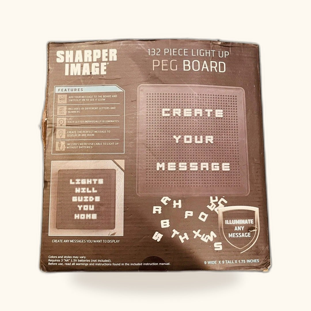 Tablero de mensajes luminoso Sharper Image, 132 piezas